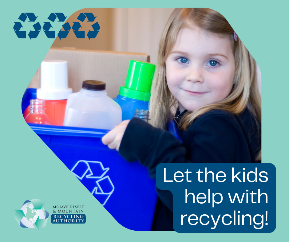 Young girl with a recycling bucket
