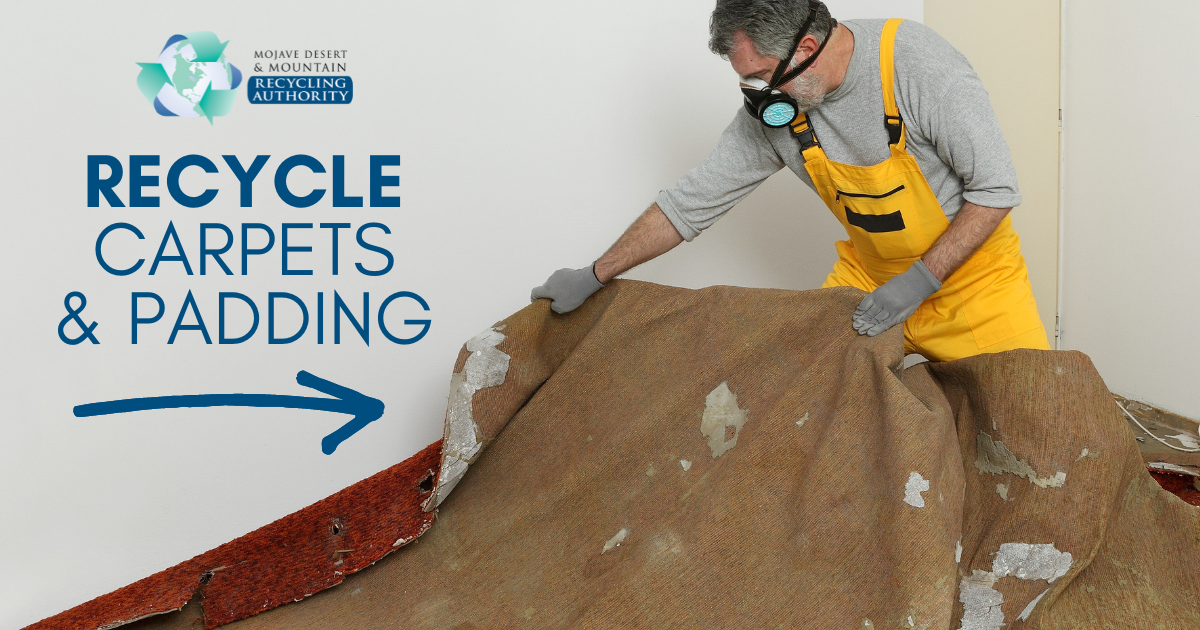 Man pulling up old carpet