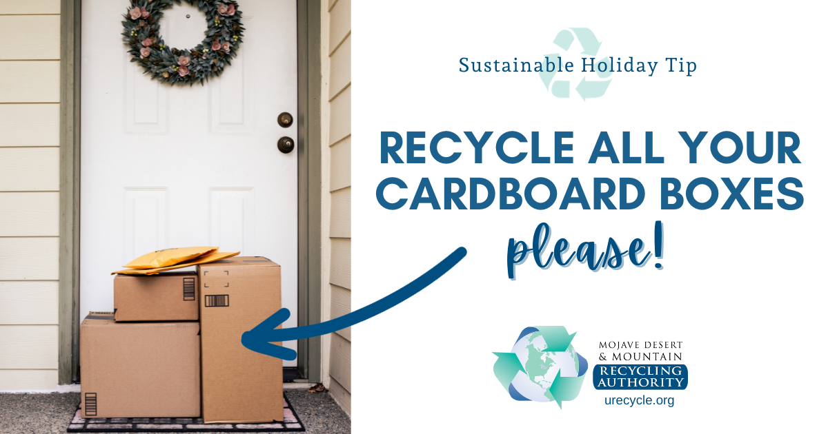 Image of cardboard boxes on doorstep with a wreath on the door