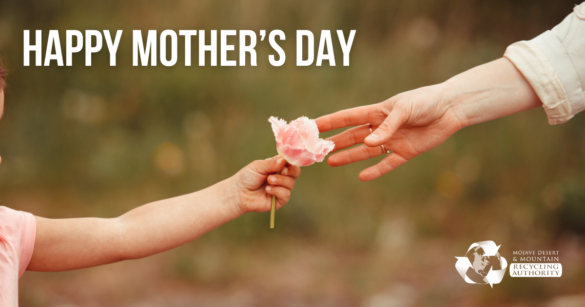 Child handing woman a flower