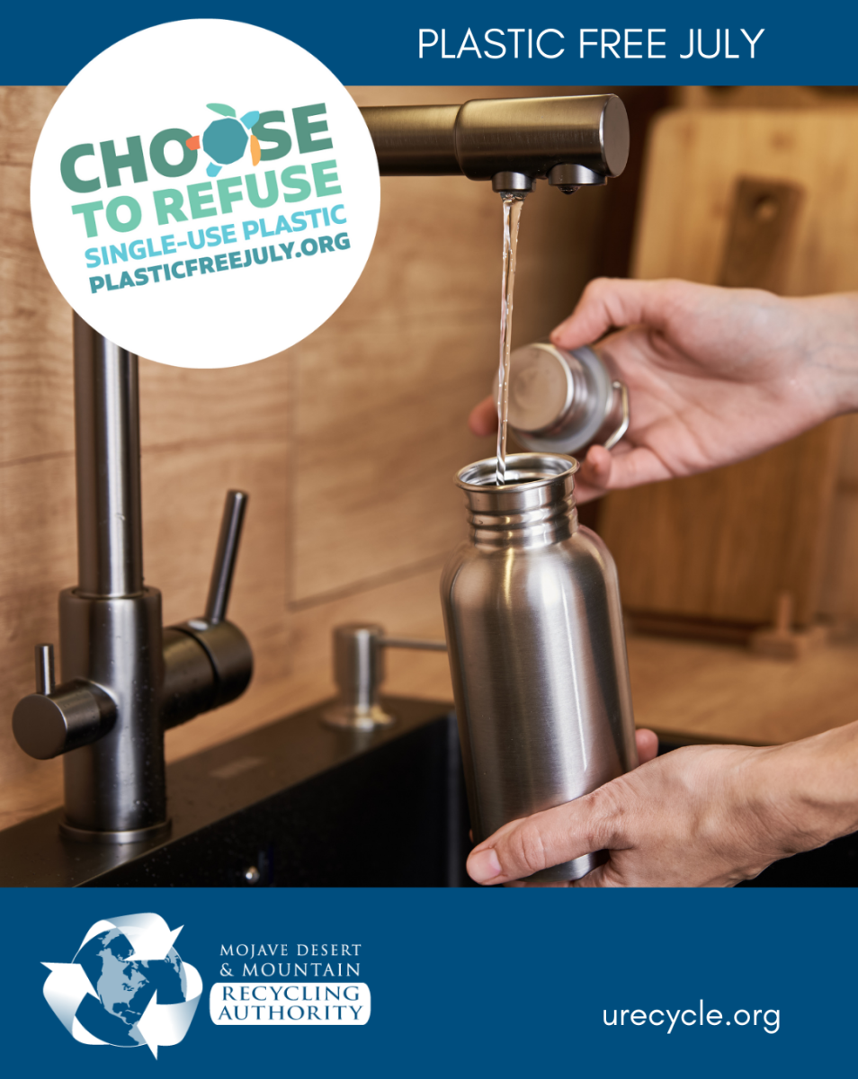 Image of person refilling a metal water bottle for Plastic Free July