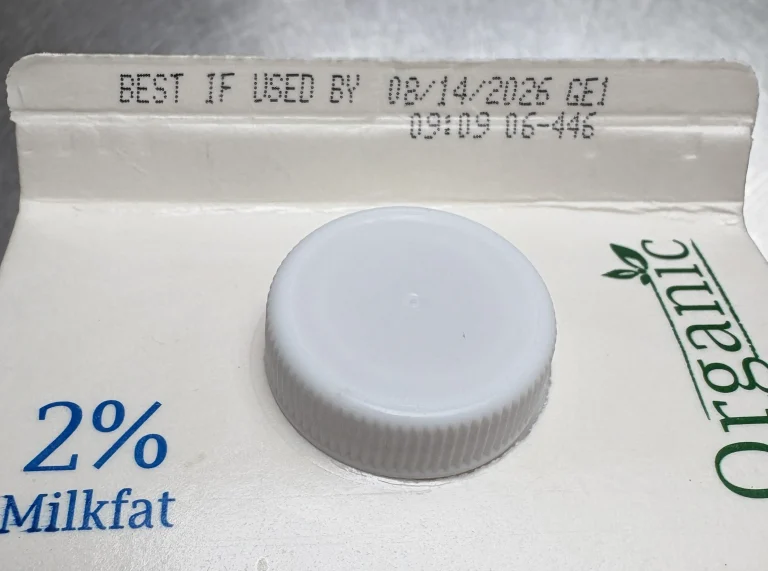 Gable top of a milk carton with a "BEST IF USED BY" date